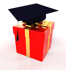 Image showing graduation hat on a red gift