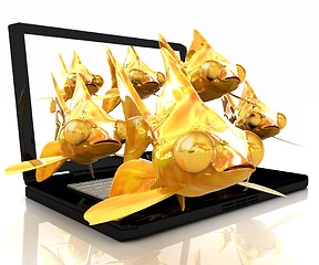 Image showing Gold fishea and laptop