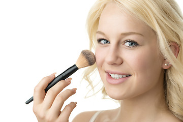 Image showing closeup makeup applying 