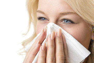 Image showing Ill woman with tissue is sneezing