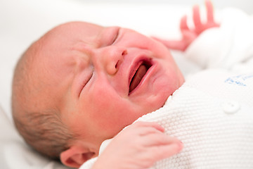 Image showing crying newborn baby in the hospital