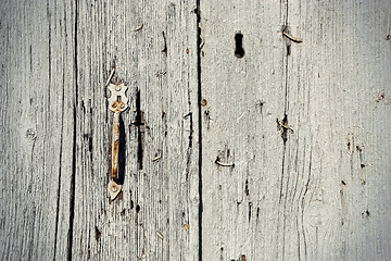 Image showing Vintage wooden door with handle