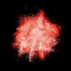 Image showing Red powder explosion isolated on black