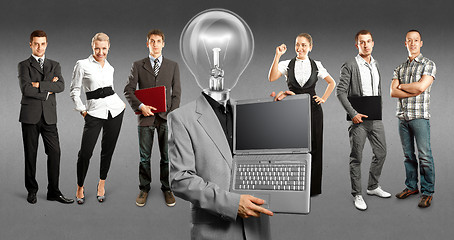 Image showing Business Team With Lamp Head