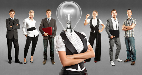 Image showing Business Team With Lamp Head