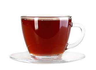 Image showing Glasses cup and saucer with black tea