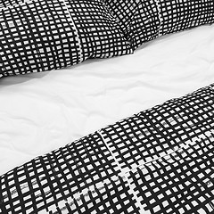 Image showing Black and white bed linen with pillows