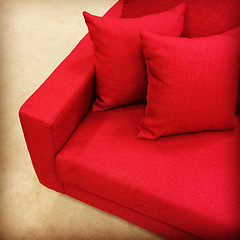 Image showing Red sofa with cushions