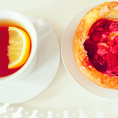 Image showing Raspberry pastry and cup of tea