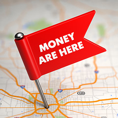 Image showing Money Are Here - Small Flag on a Map Background.