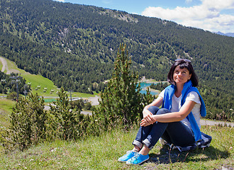 Image showing Woman relaxing in the mountain