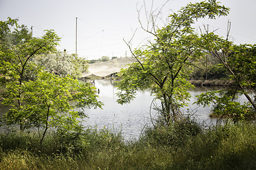 Image showing Fishing huts on the lagoon