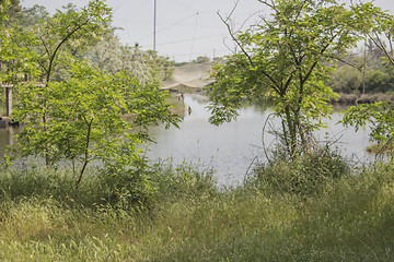 Image showing Fishing huts on the lagoon