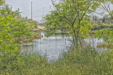 Image showing Fishing huts on the lagoon