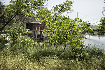 Image showing Fishing huts on the lagoon