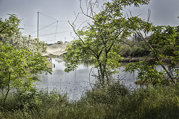 Image showing Fishing huts on the lagoon