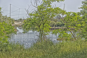 Image showing Fishing huts on the lagoon