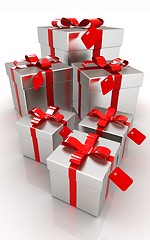 Image showing Gifts with red ribbon