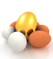 Image showing Eggs and gold easter egg