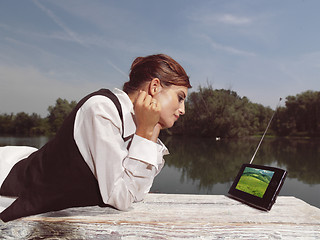 Image showing a woman with laptop in park