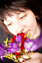 Image showing beautiful woman with purple flowers