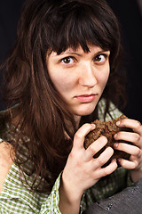 Image showing beggar woman with a piece of bread 