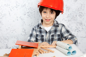 Image showing boy plans to build a house