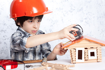 Image showing boy built a new house