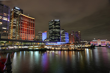 Image showing Circular Quay and Sydney City Buildings in colour during Vivid S