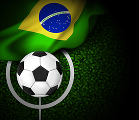 Image showing Football field with ball and flag of Brazil