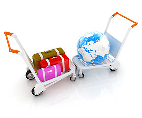 Image showing Trolley for luggage at the airport and earth. International tour