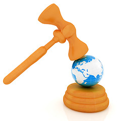 Image showing Wooden gavel and earth isolated on white background. Global auct