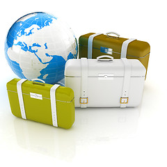 Image showing travel bags and earth on white 