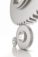 Image showing White background consisting of bright gears and arrows.The conce
