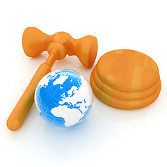 Image showing Wooden gavel and earth isolated on white background. Global auct