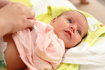 Image showing dressing baby after bath