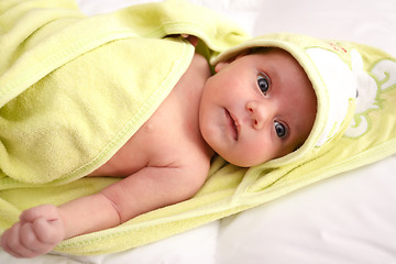 Image showing infant wrapped in a towel after bath