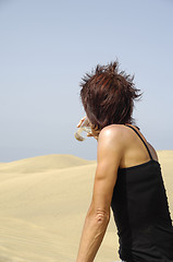 Image showing Woman, water and desert