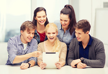 Image showing smiling students with tablet pc at school