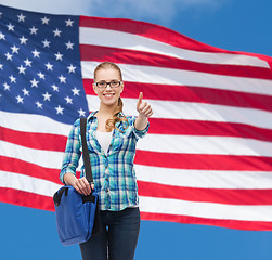 Image showing student with laptop bag showing thumbs up