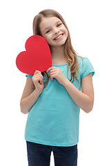 Image showing smiling little girl with red heart