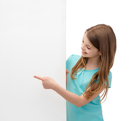 Image showing happy little girl with blank white board