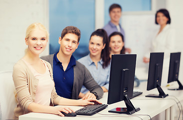 Image showing students with computer monitor at school