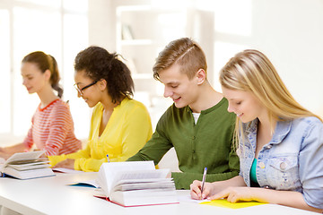 Image showing students with textbooks and books at school