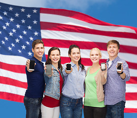 Image showing students showing blank smartphones screens