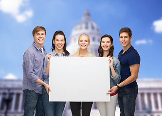 Image showing group of standing students with blank white board