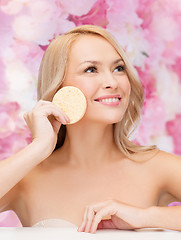 Image showing beautiful woman with sponge