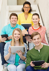 Image showing smiling students with tablet pc computer