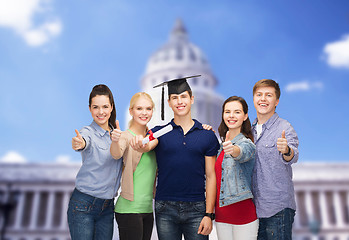 Image showing group of students with diploma showing thumbs up