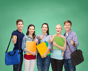 Image showing group of smiling students showing thumbs up